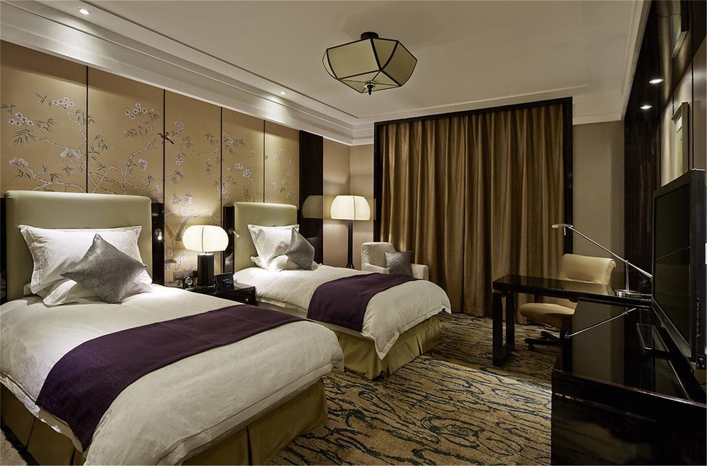 Geneva Hotel Tianjin Room photo